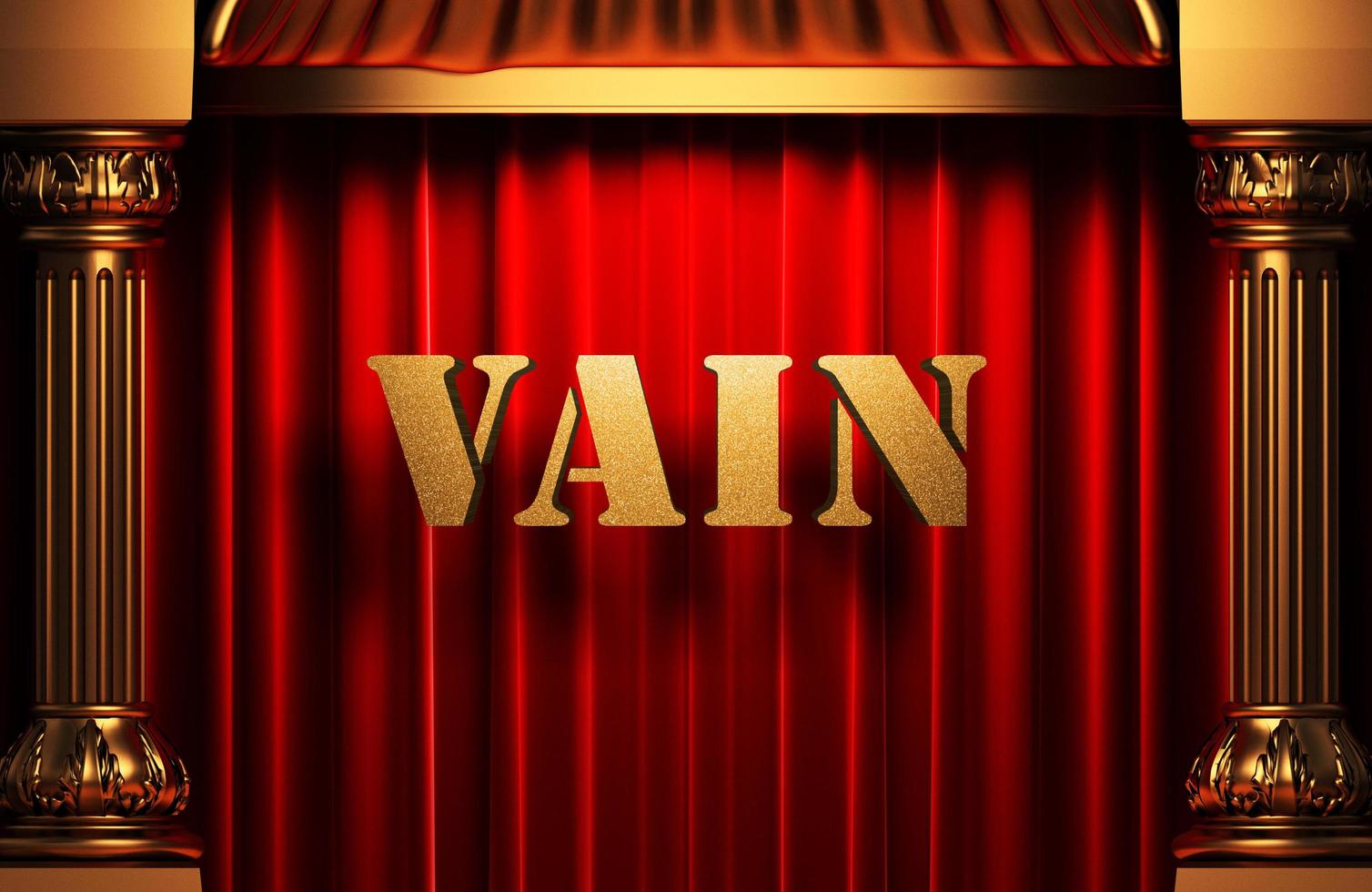 vain golden word on red curtain photo