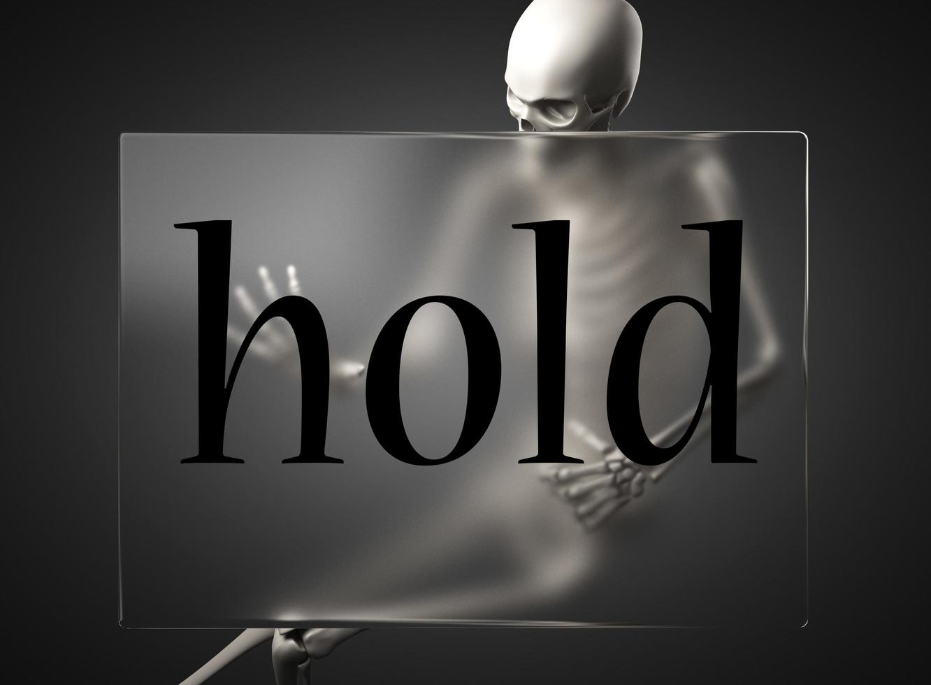 hold word on glass and skeleton photo