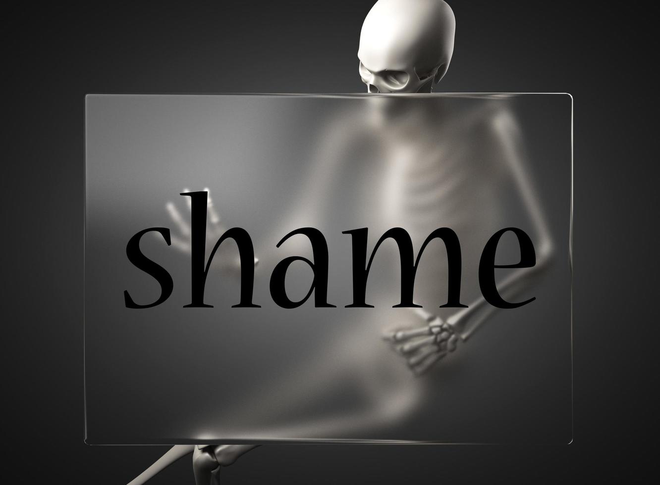 shame word on glass and skeleton photo