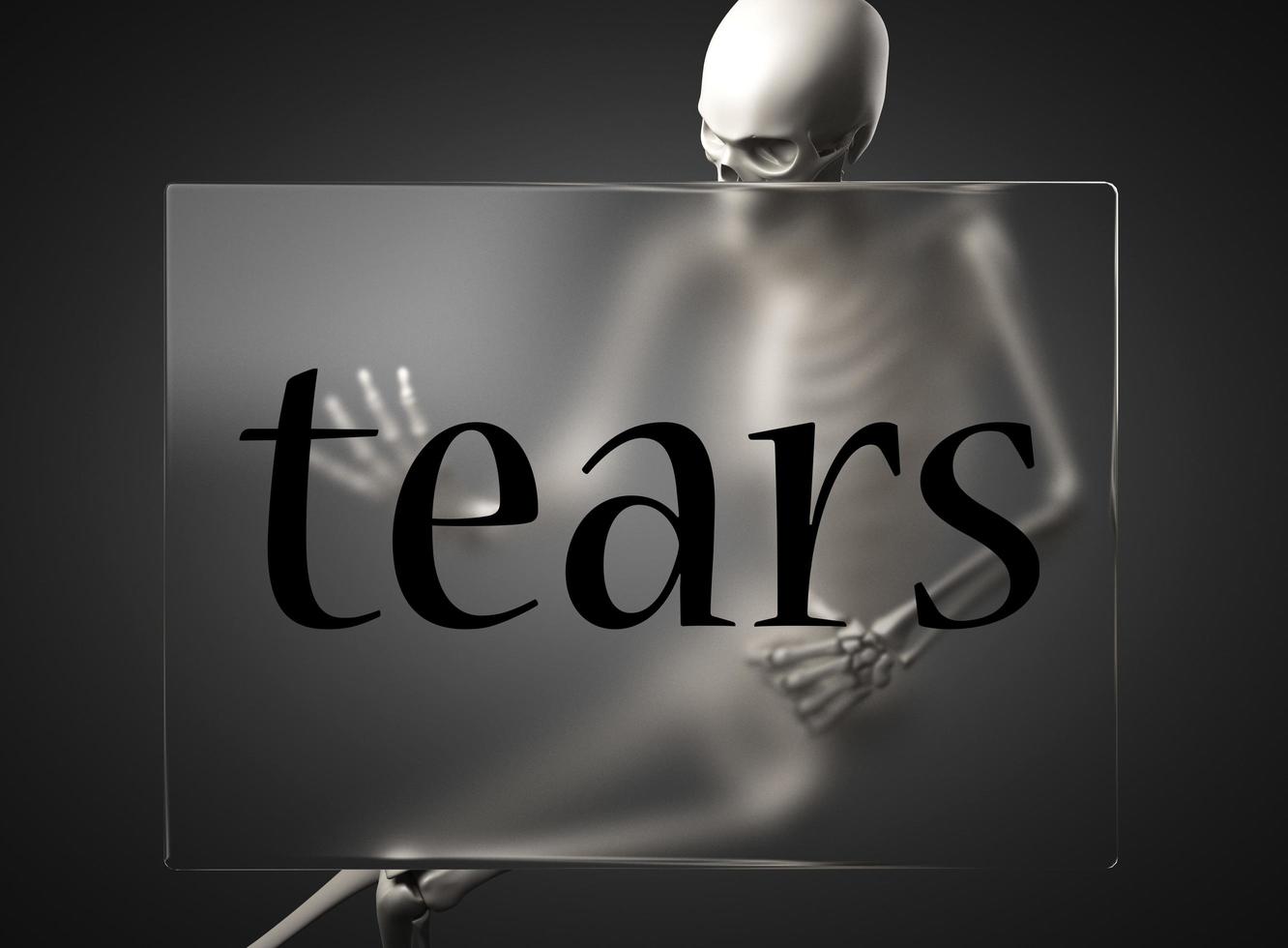 tears word on glass and skeleton photo