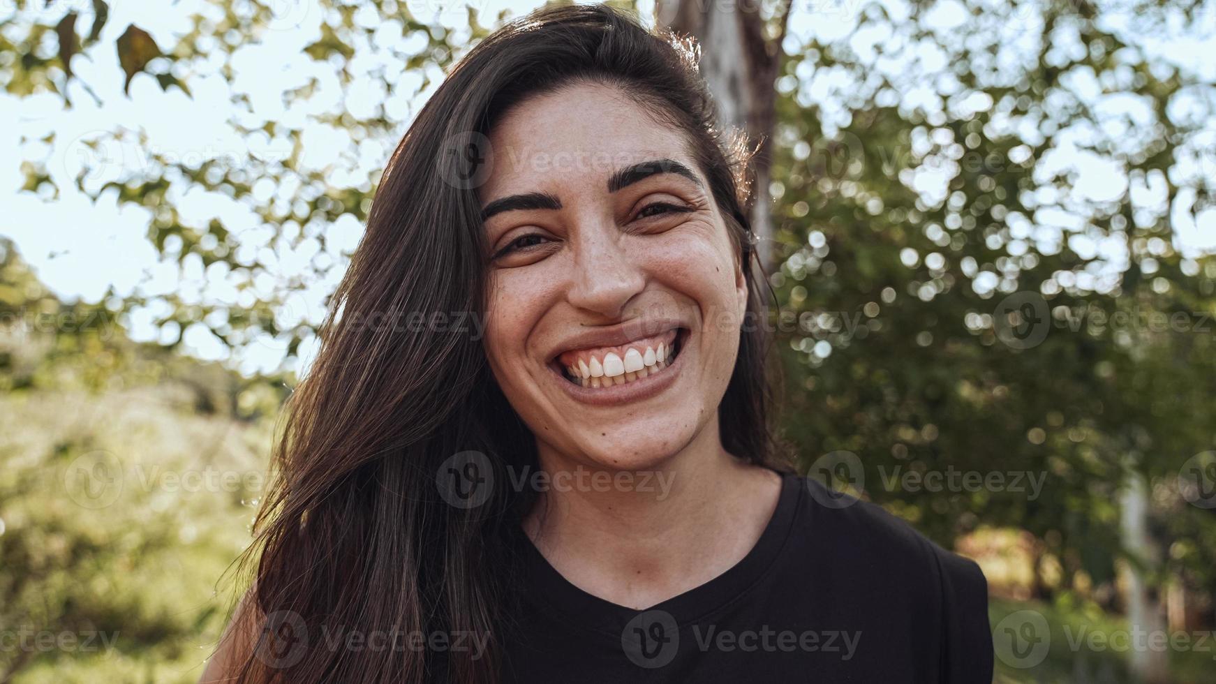Smiling latin Brazilian woman in the farm. Joy, positive and love. photo