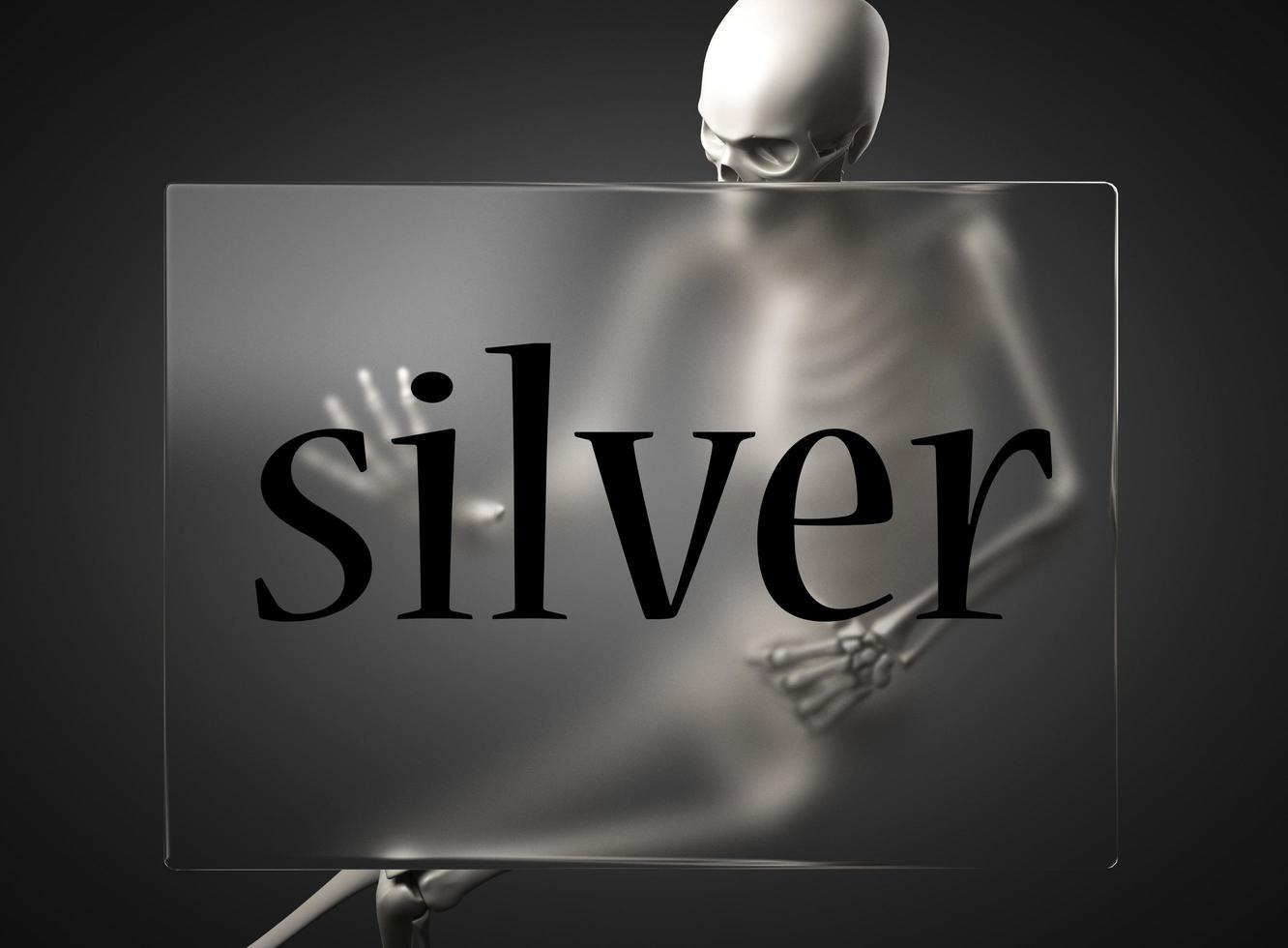 palabra de plata sobre vidrio y esqueleto foto