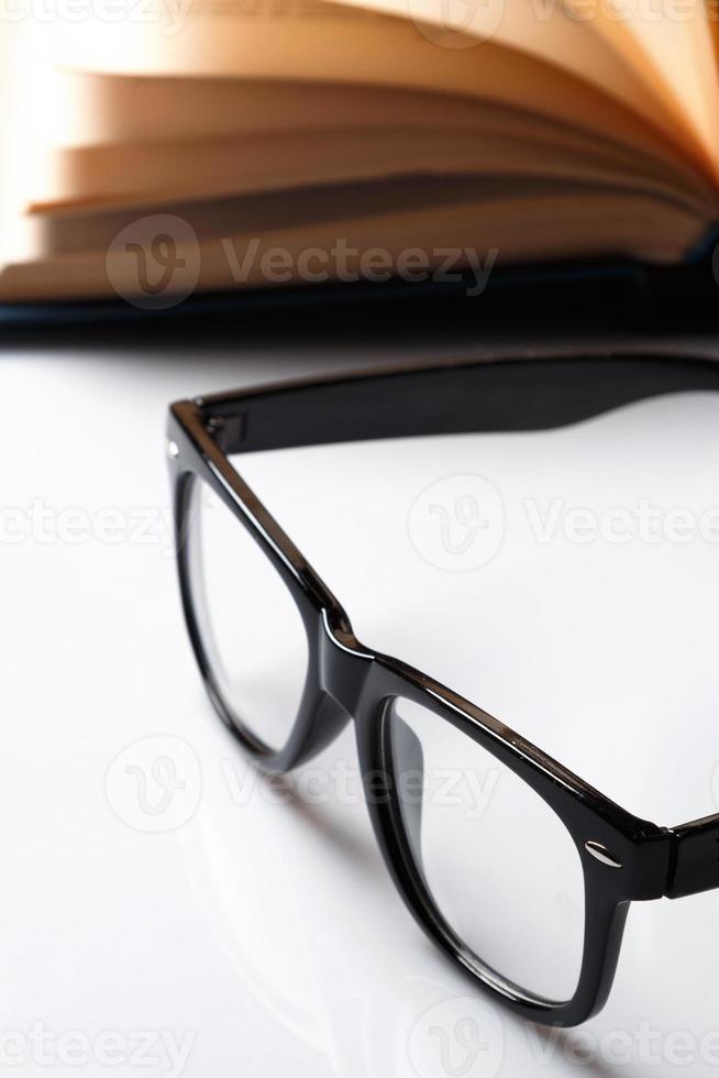 Eyeglasses and book photo