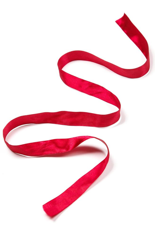 Red ribbon on white photo