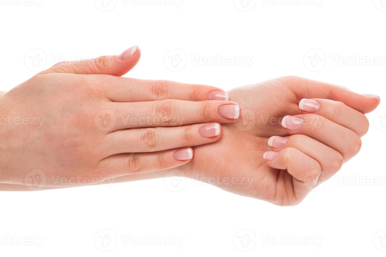 Hands with french manicure photo