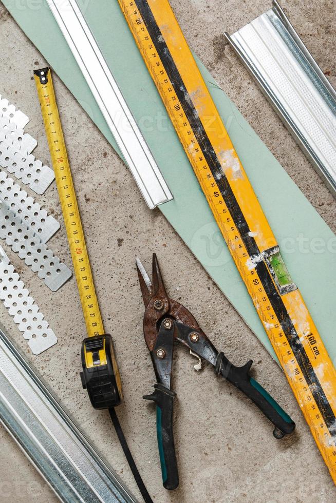 Instruments for build a plasterboard walls photo