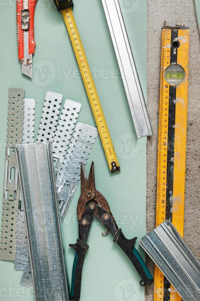 Instruments for build a plasterboard walls photo