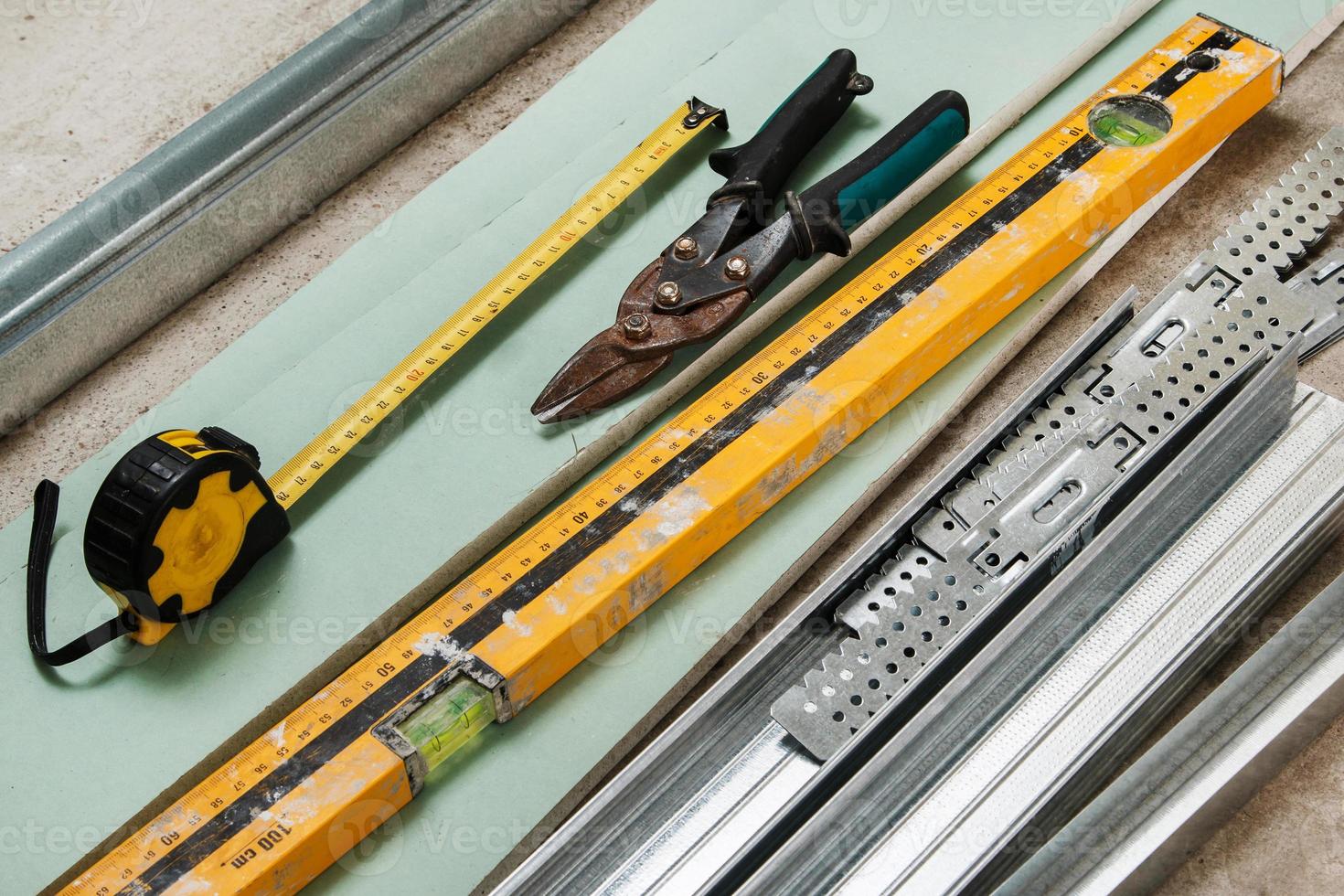 Instruments for build a plasterboard walls photo