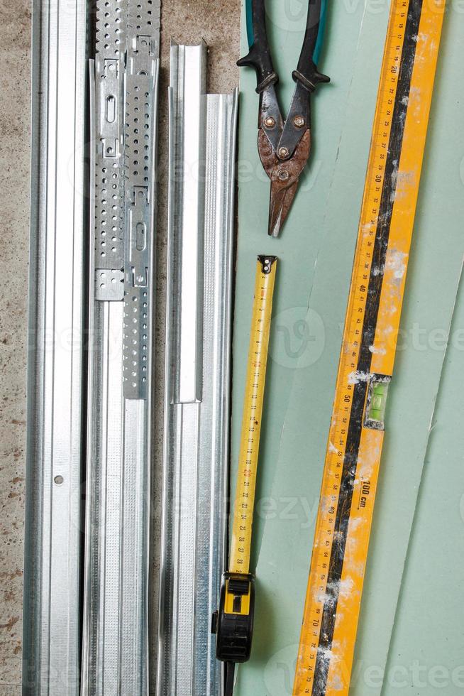 Instruments for build a plasterboard walls photo