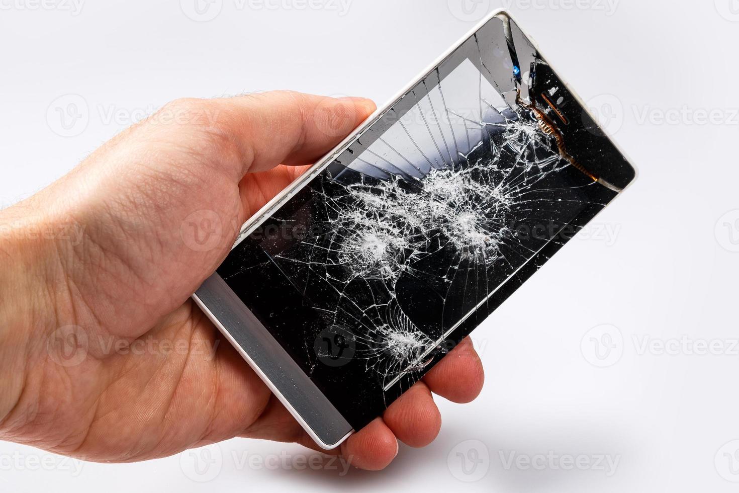 Smartphone with cracked display photo