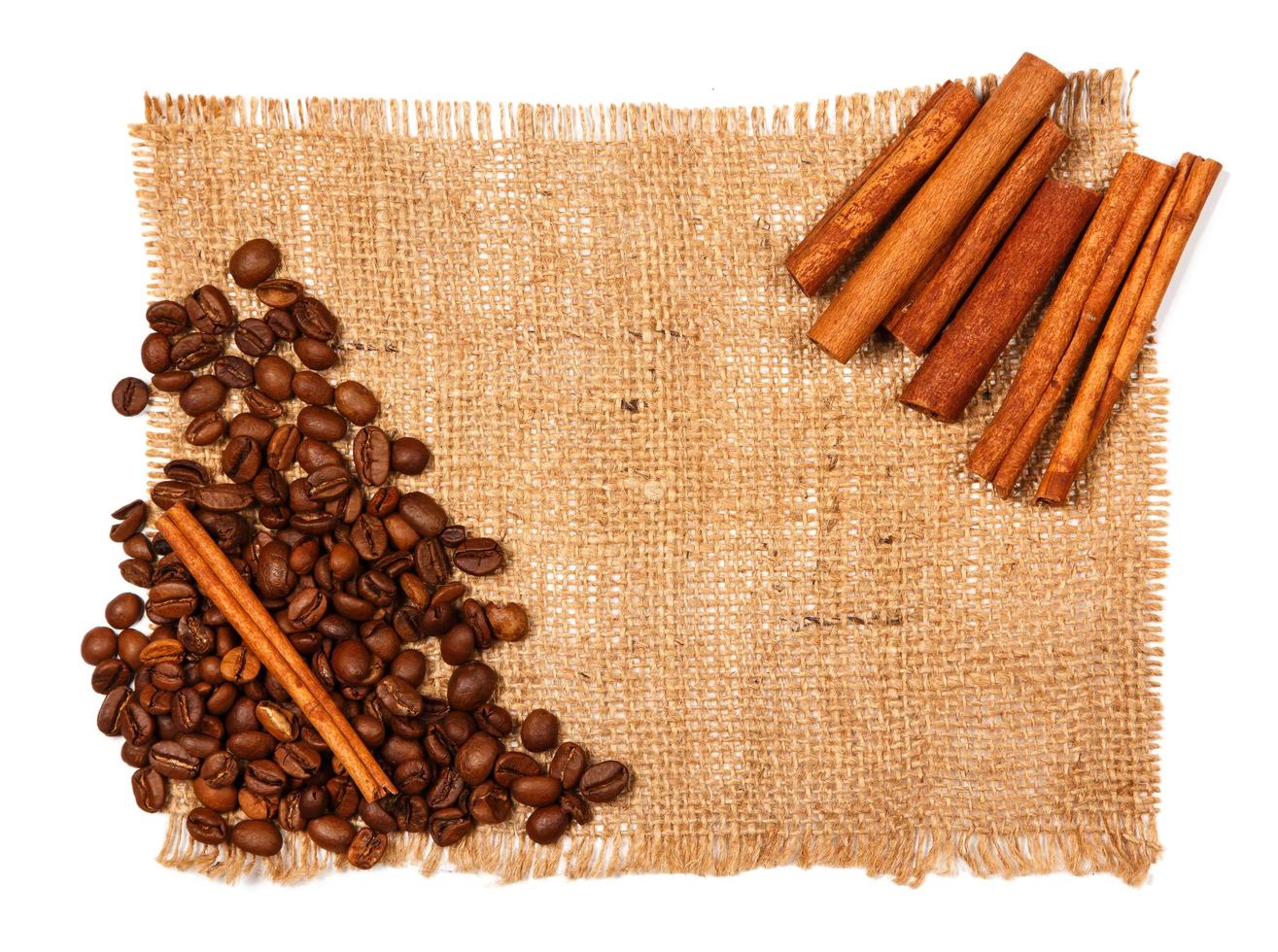 Cinnamon stick and coffee beans photo