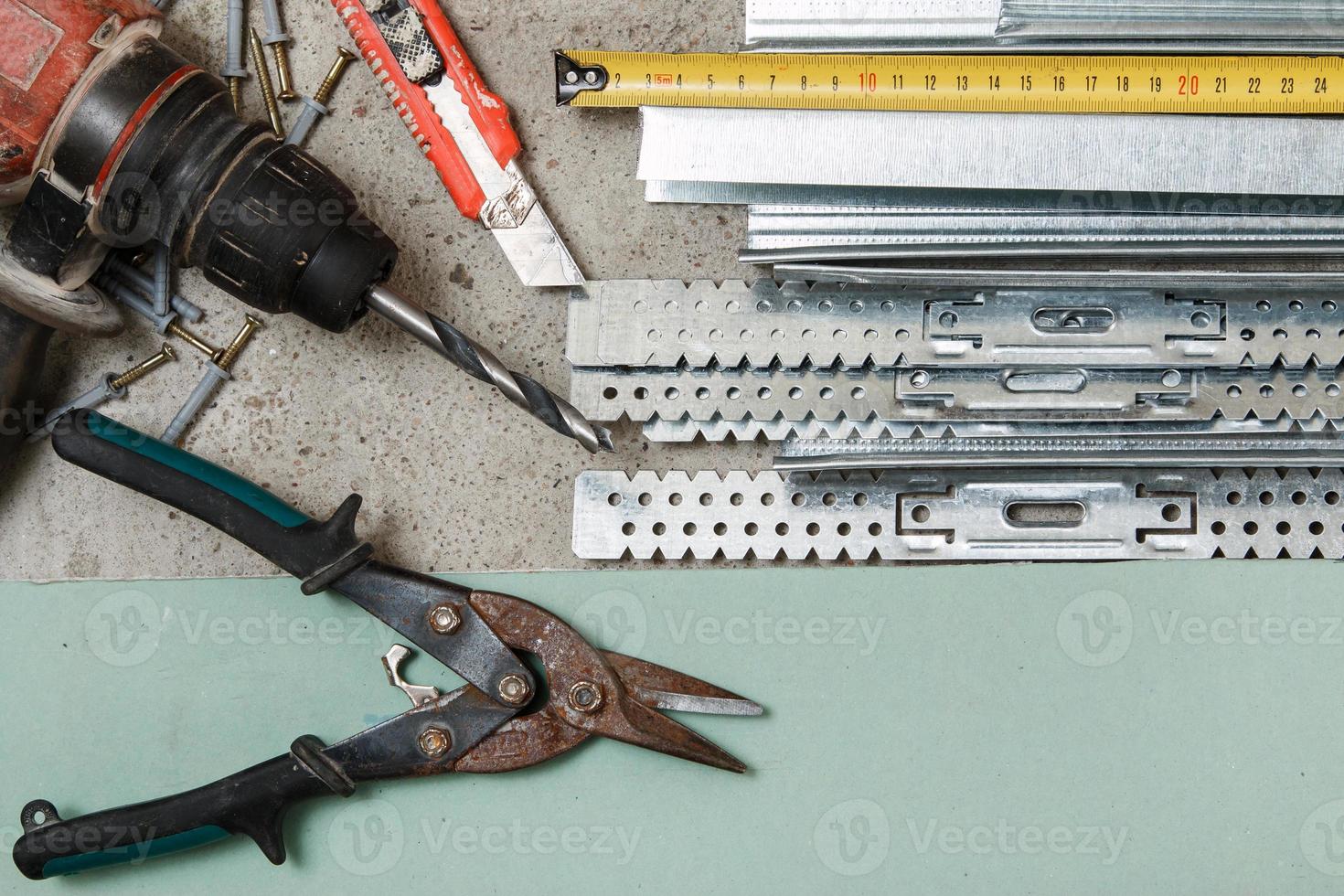 instrumentos para construir paredes de cartón yeso foto