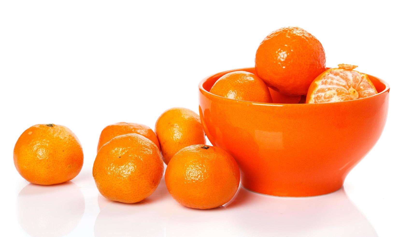 Fresh mandarins in bowl photo