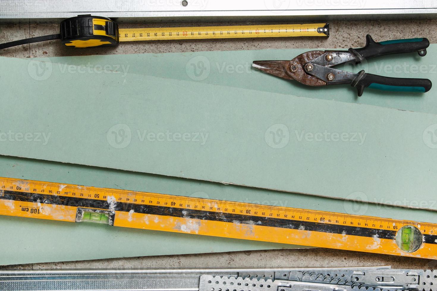 Instruments for build a plasterboard walls photo