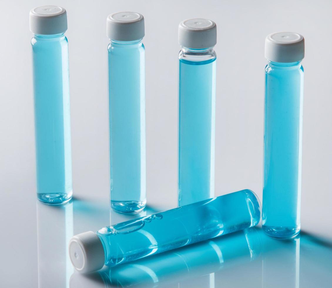 Bottles with blue liquid photo