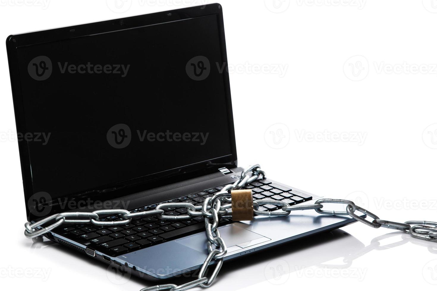 Padlock and chain on keyboard photo