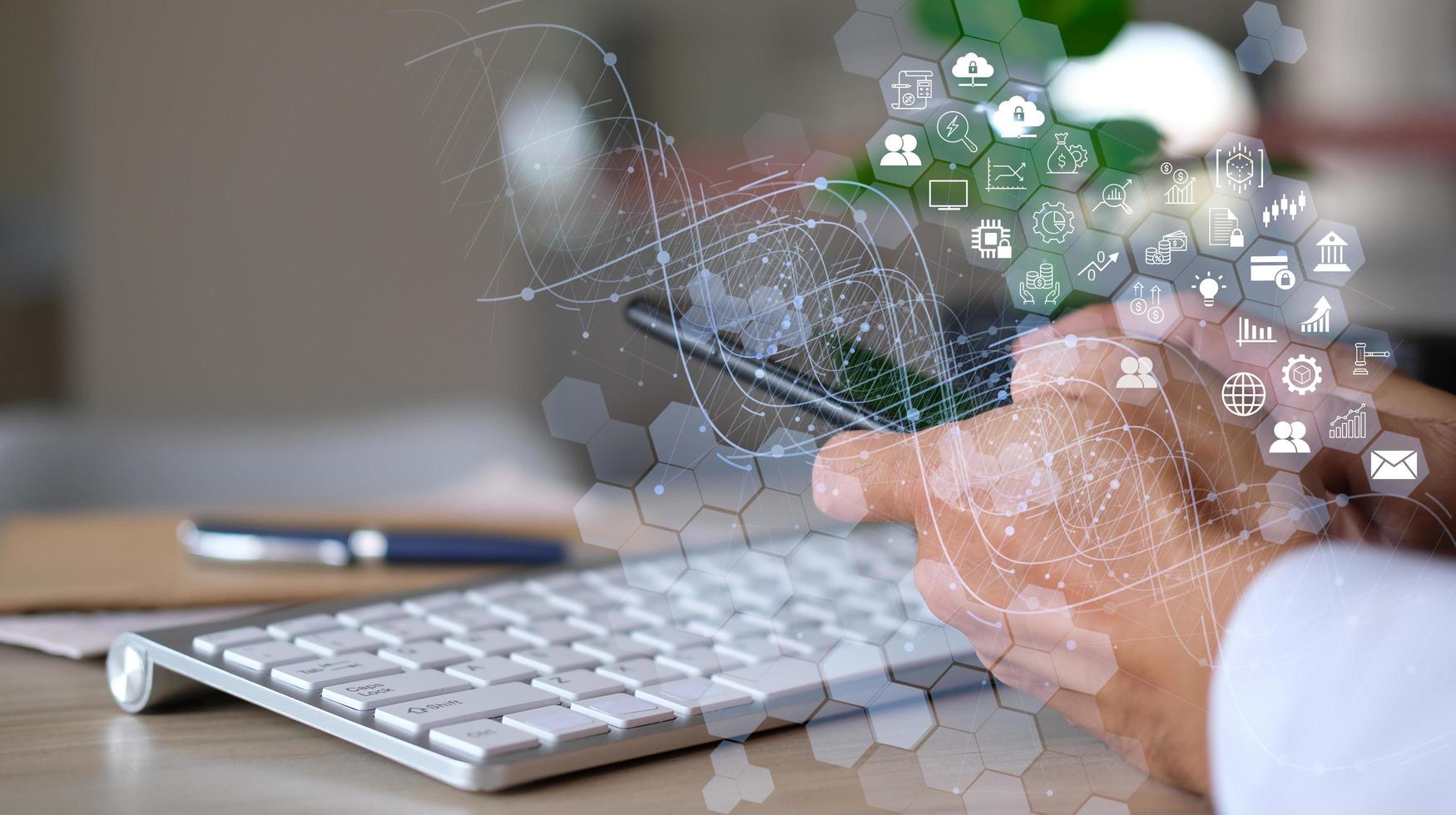 Double exposure of businessman unlocks and connects to his company's data network using his smartphone and fingerprint scanning. Business transactions are protected from online digital cyber attacks photo