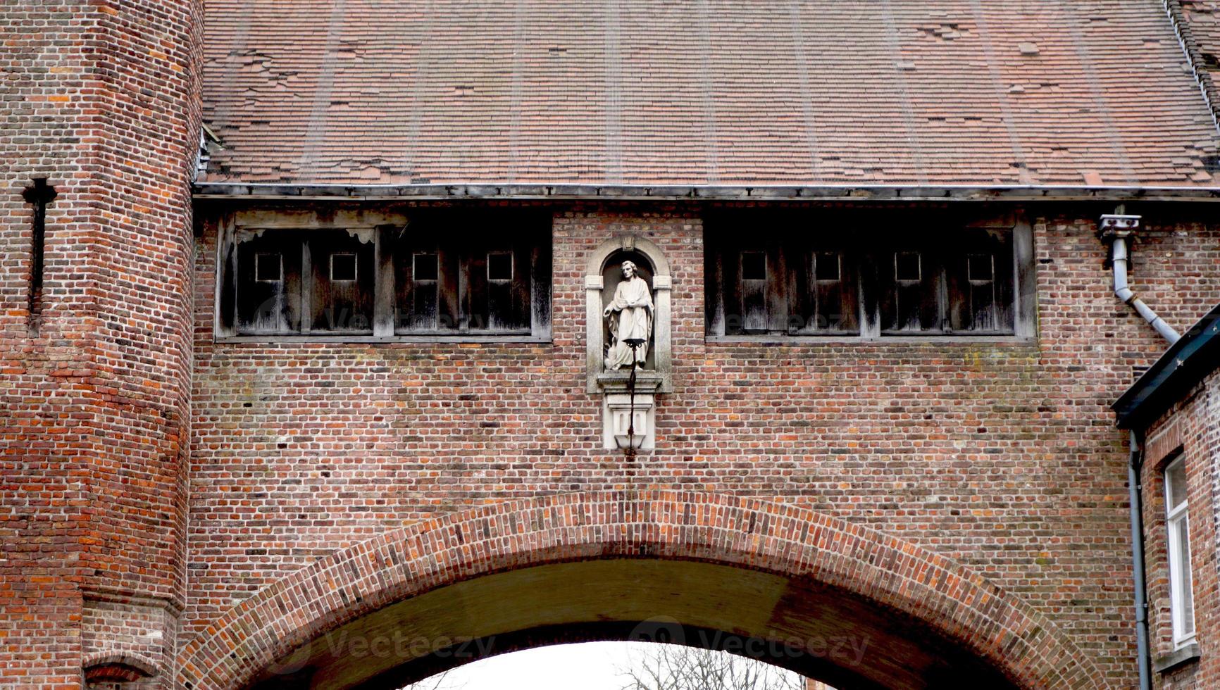 Historical architecture brick texture details in Brugge Belgium, Europe photo