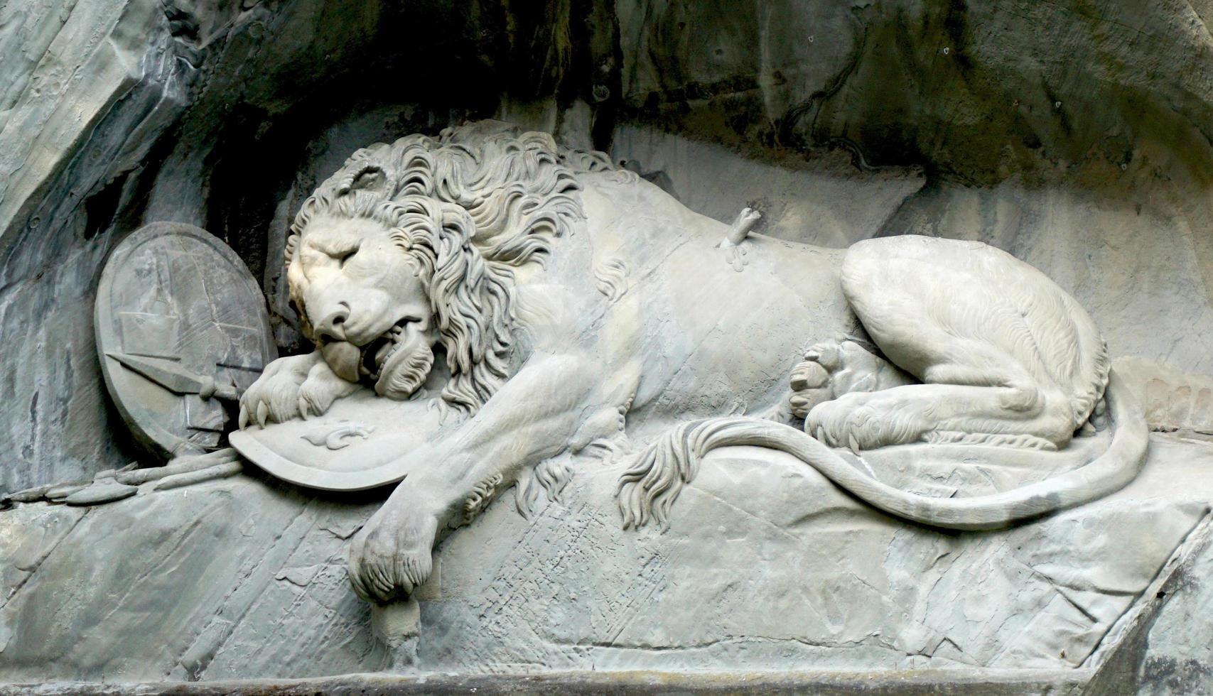 close up lion monument in Lucerne photo