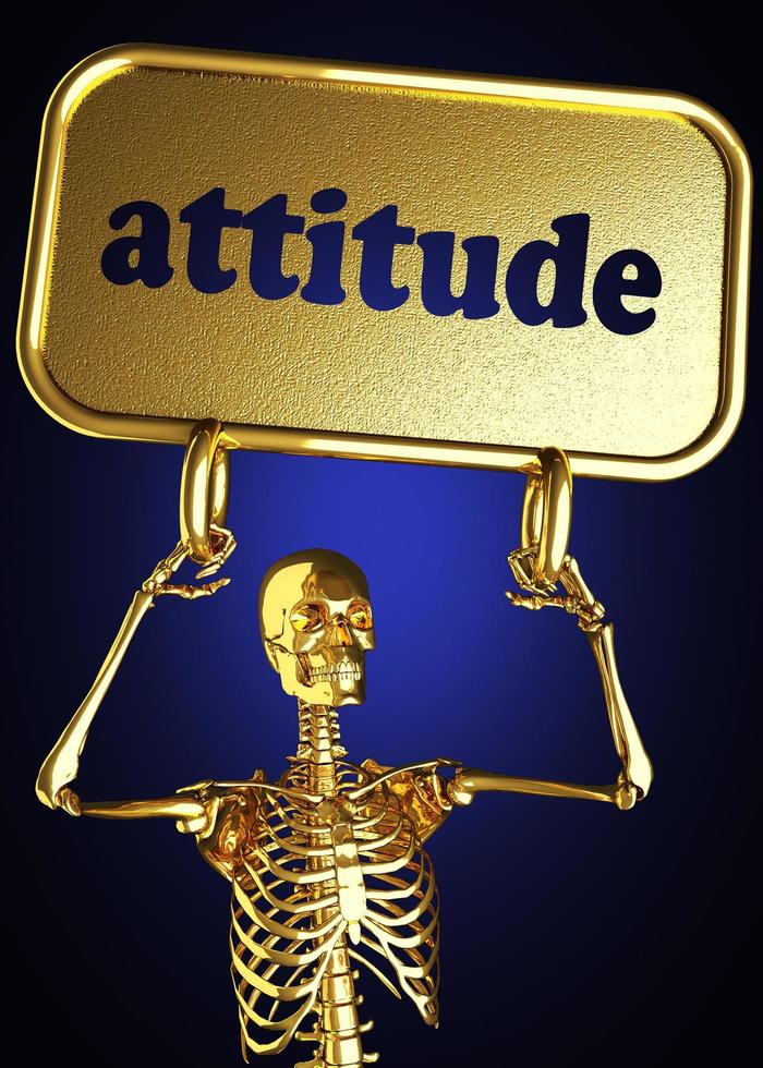 palabra de actitud y esqueleto dorado foto