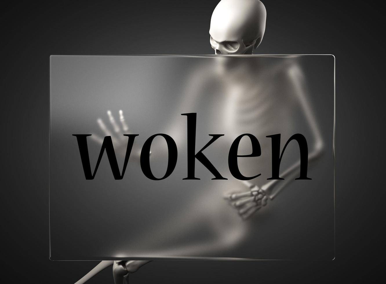 woken word on glass and skeleton photo