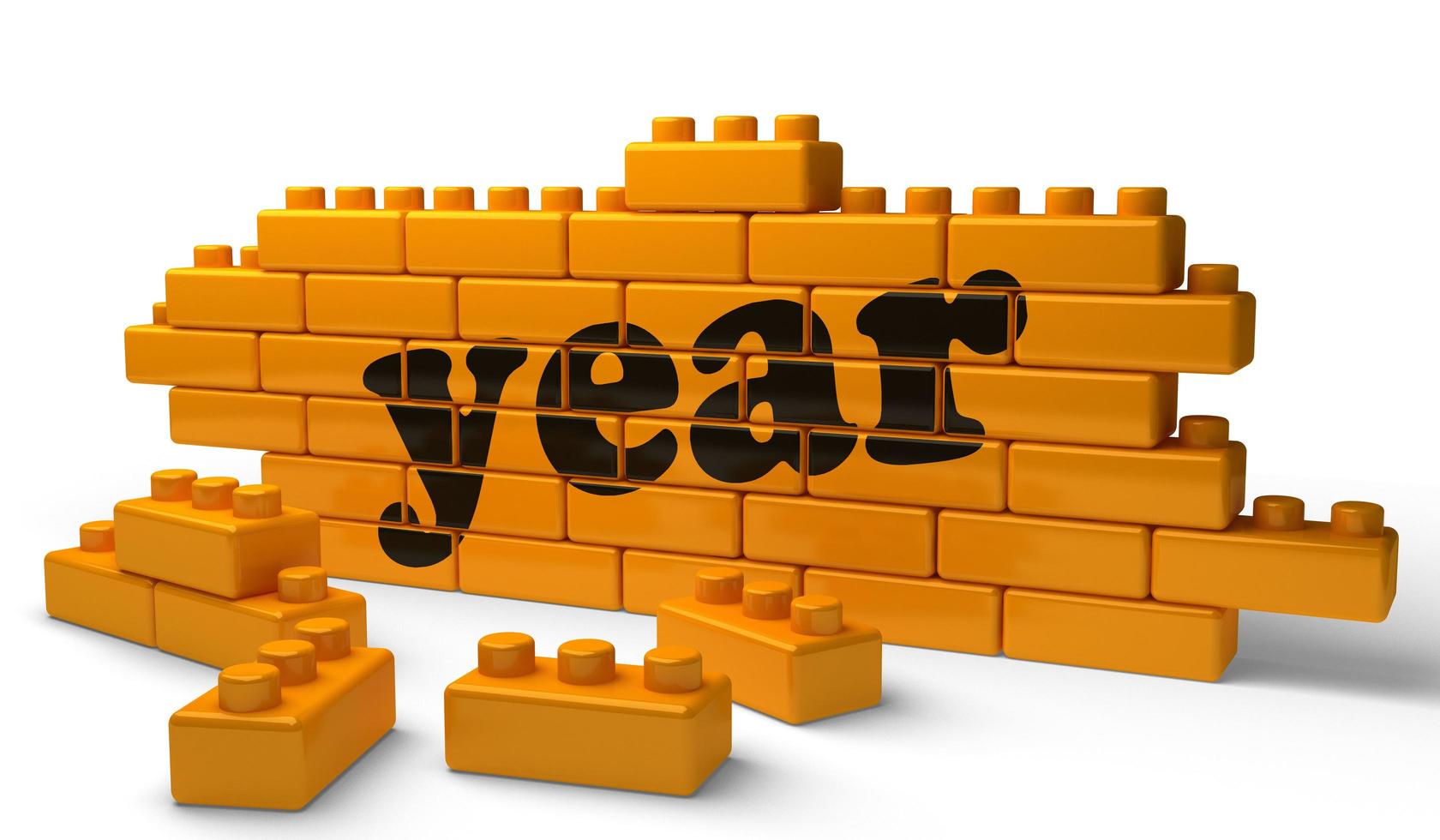 year word on yellow brick wall photo