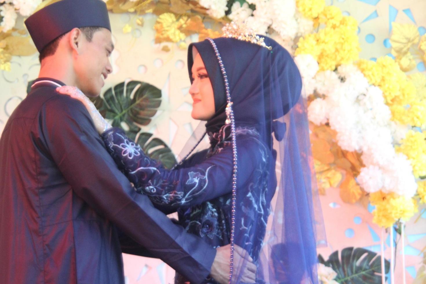 Romantic Indonesian Muslim Bride photo