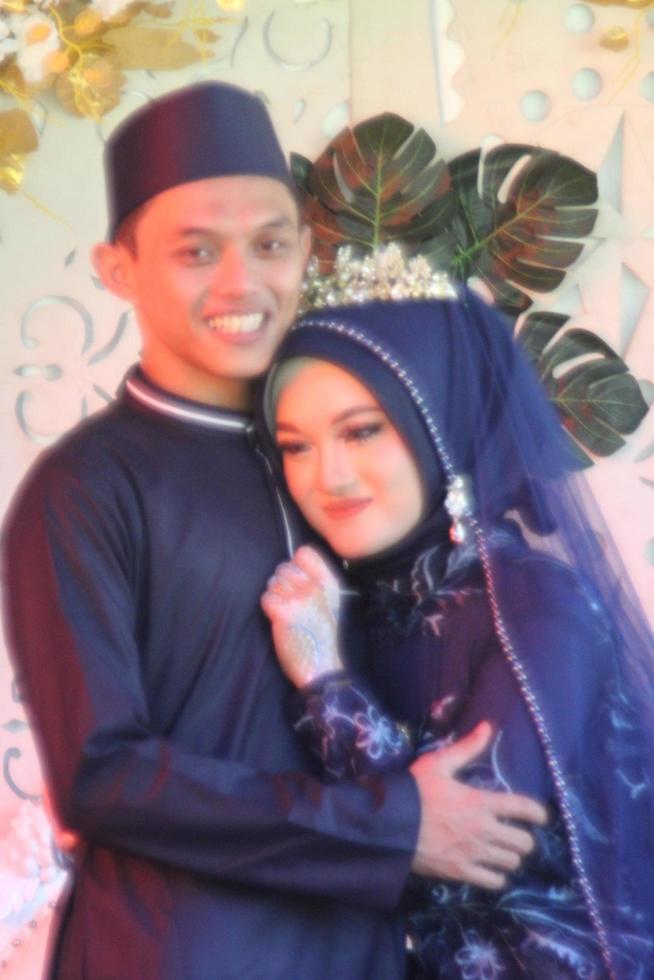 Romantic Indonesian Muslim Bride photo