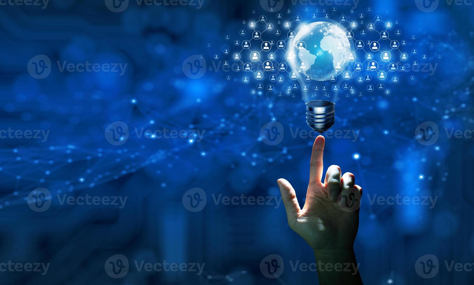 Hand holding Light bulb people network and global communication concept Business technology. Copy space. photo