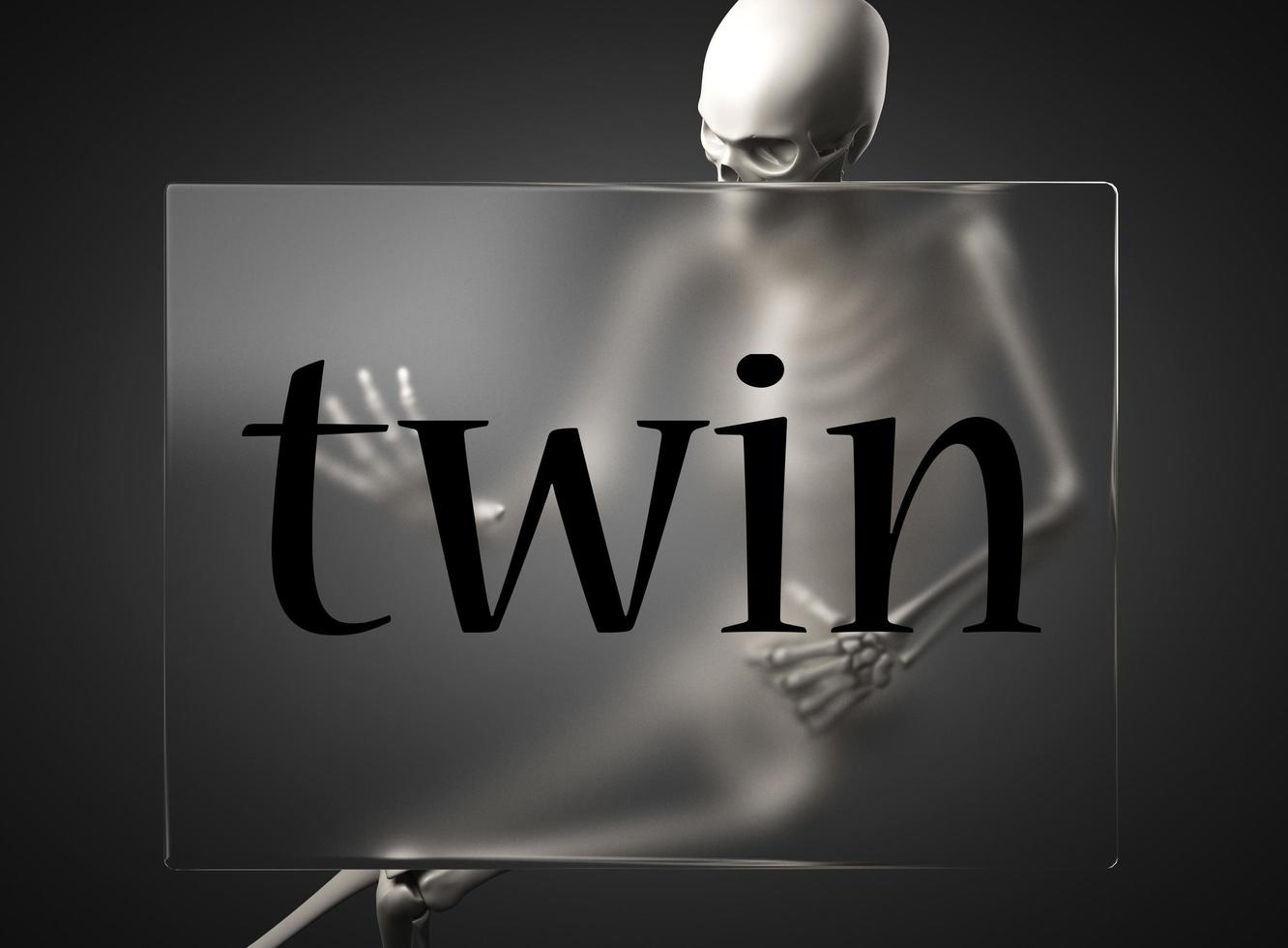 twin word on glass and skeleton photo