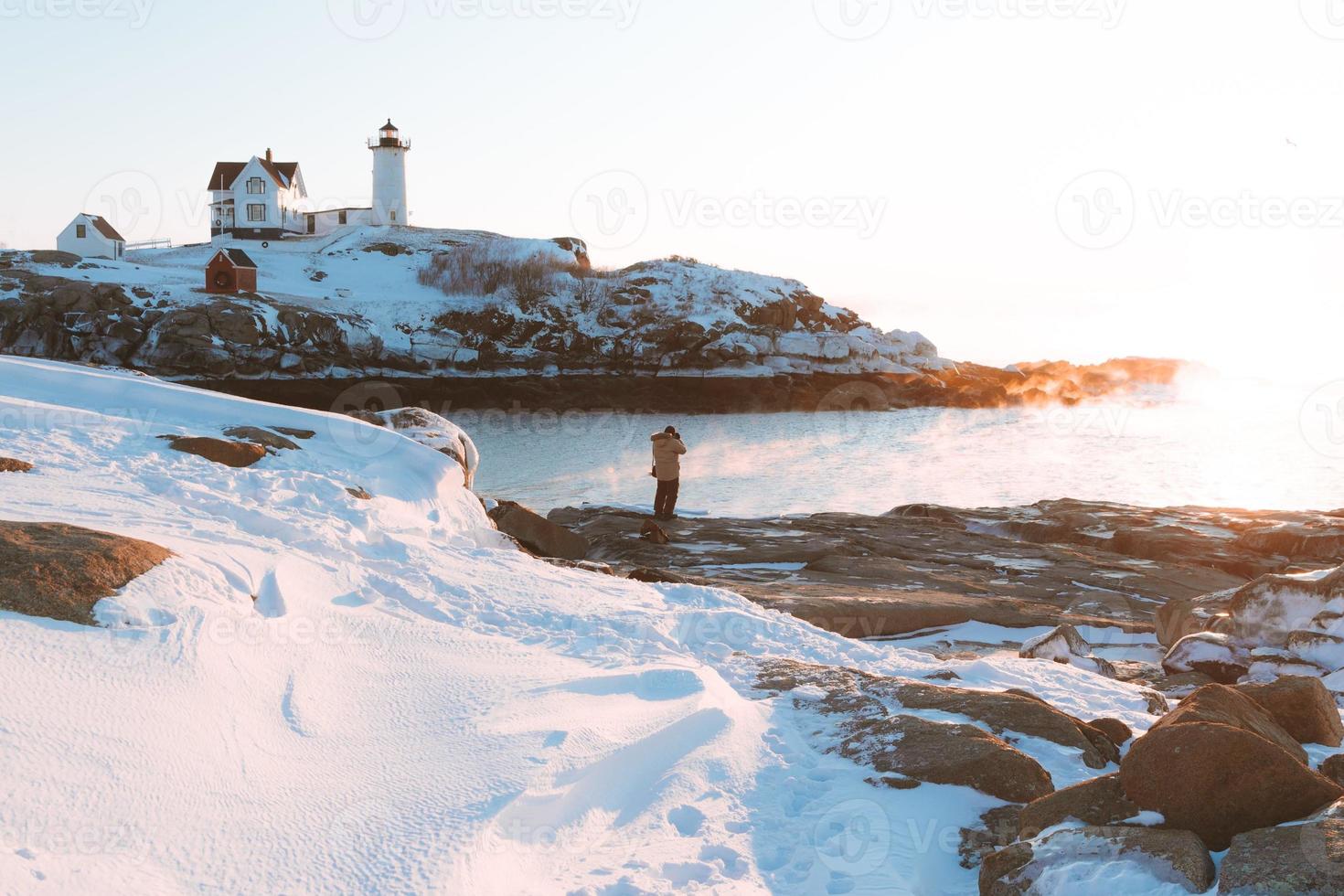 Person on a white sandy beach photo