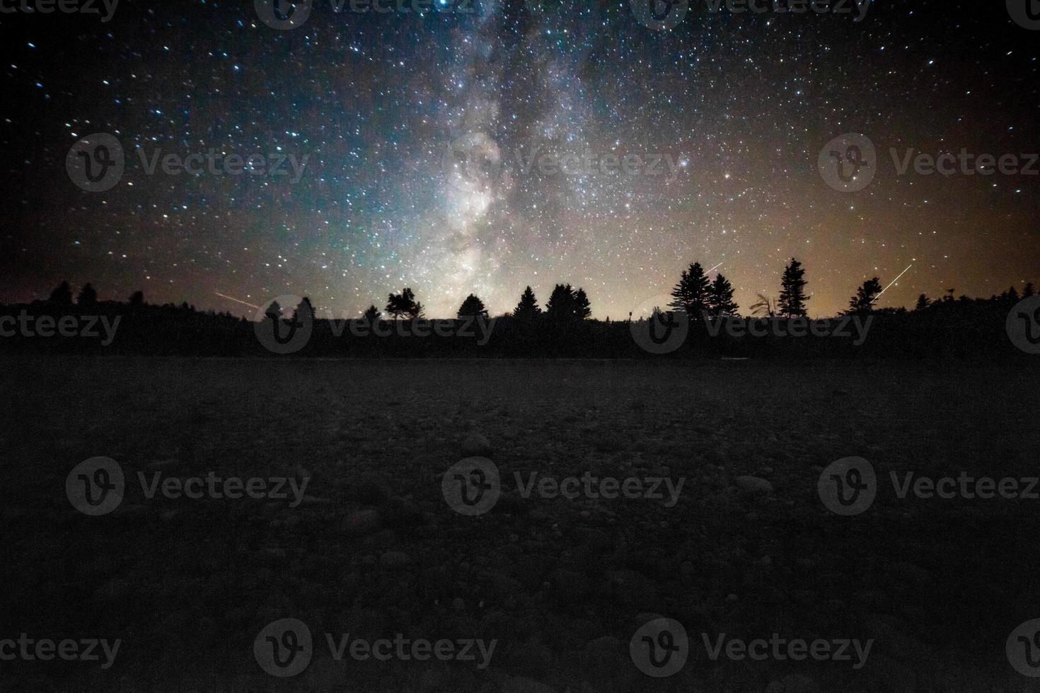 Desert silhouette and night sky photo