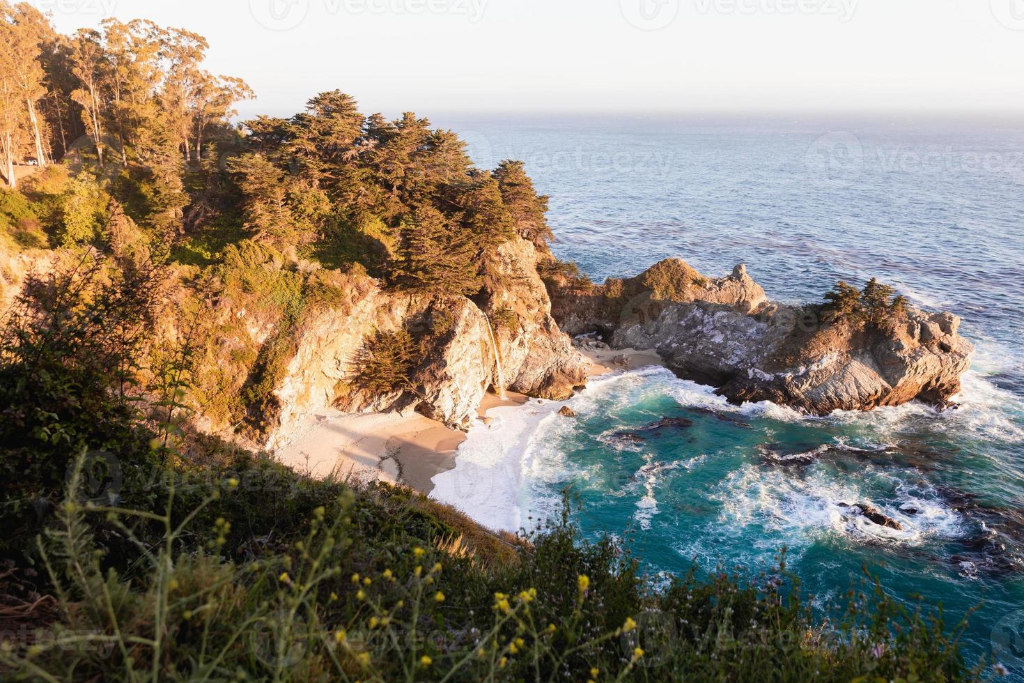 Rocky coast and blue ocean photo