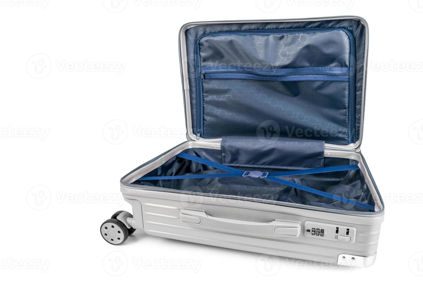 Luggage bag open with copy space on isolated white photo