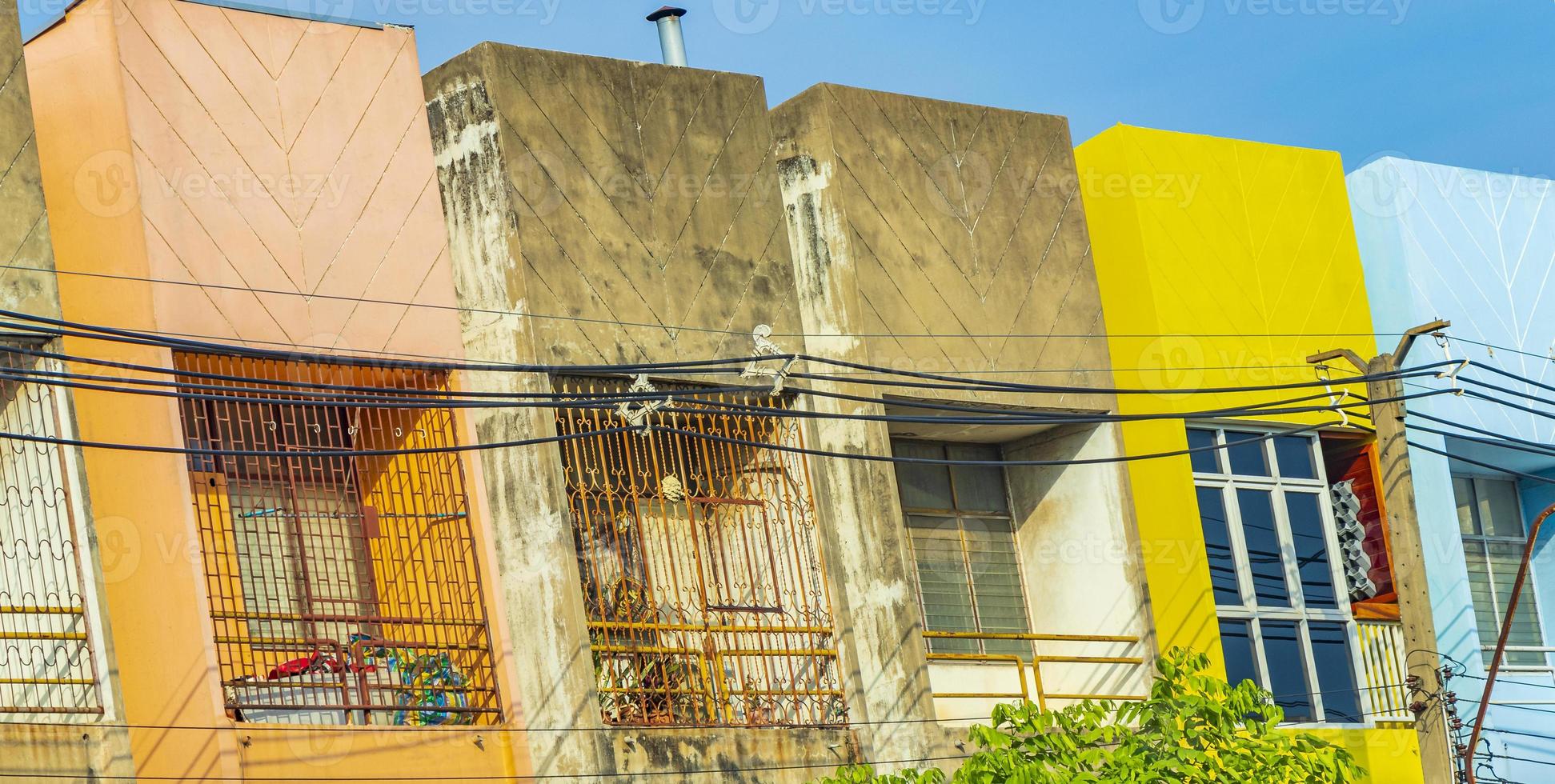 Colorful shabby old and dirty apartments Don Mueang Bangkok Thailand. photo