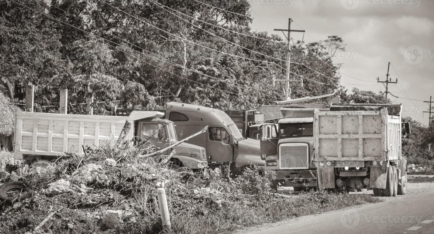 Trucks dump truck excavators and other industrial vehicles Tulum Mexico. photo