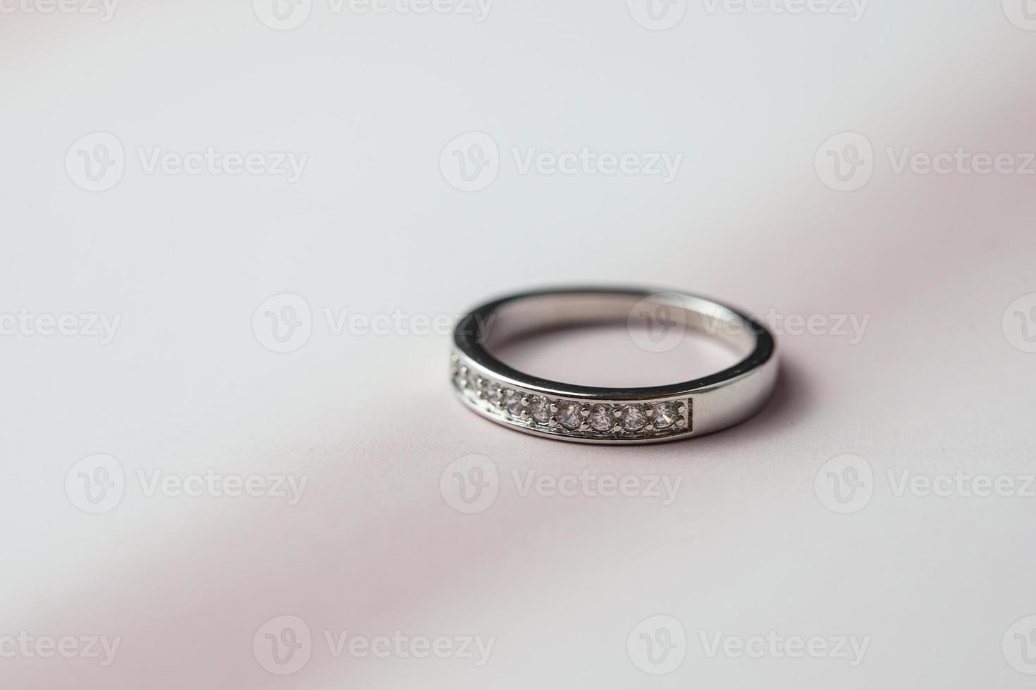 Close up of engagement diamond ring. Love and wedding concept. photo