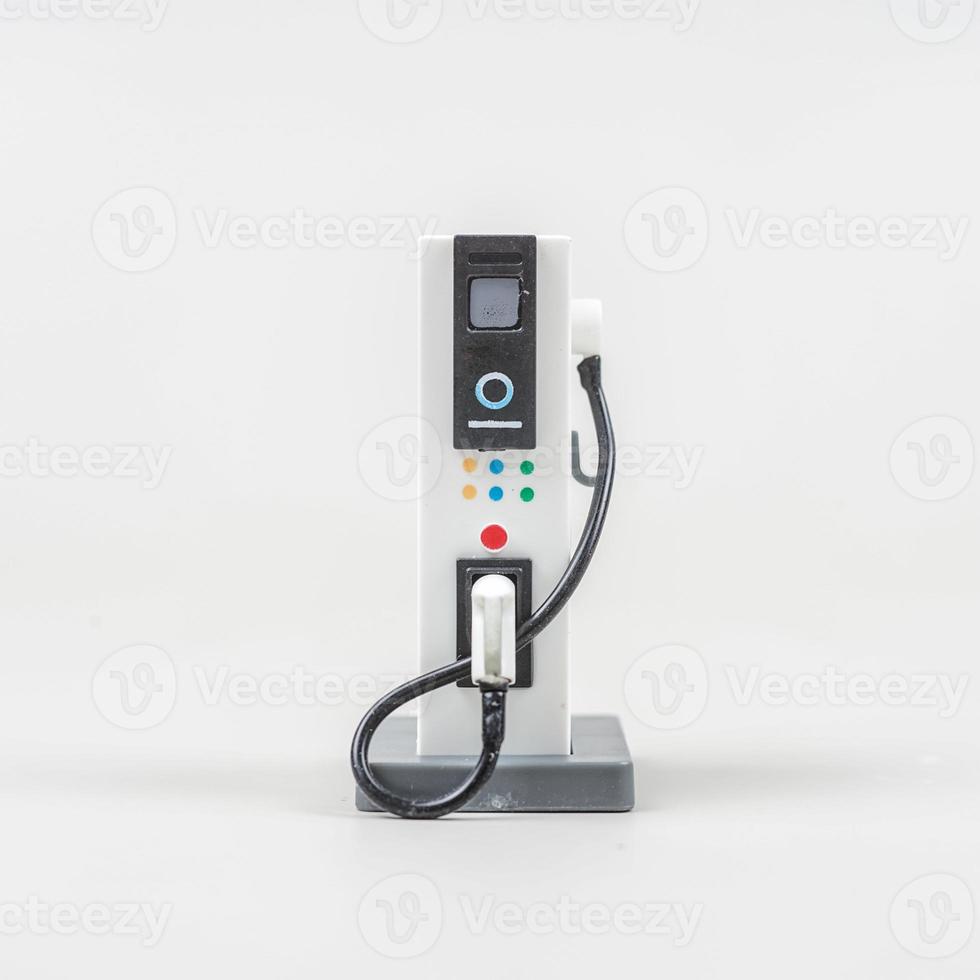 electric vehicle charging station for charging EV batteries. Plug for vehicle with electric engine.  EV charging station for electric vehicles in green energy and eco photo