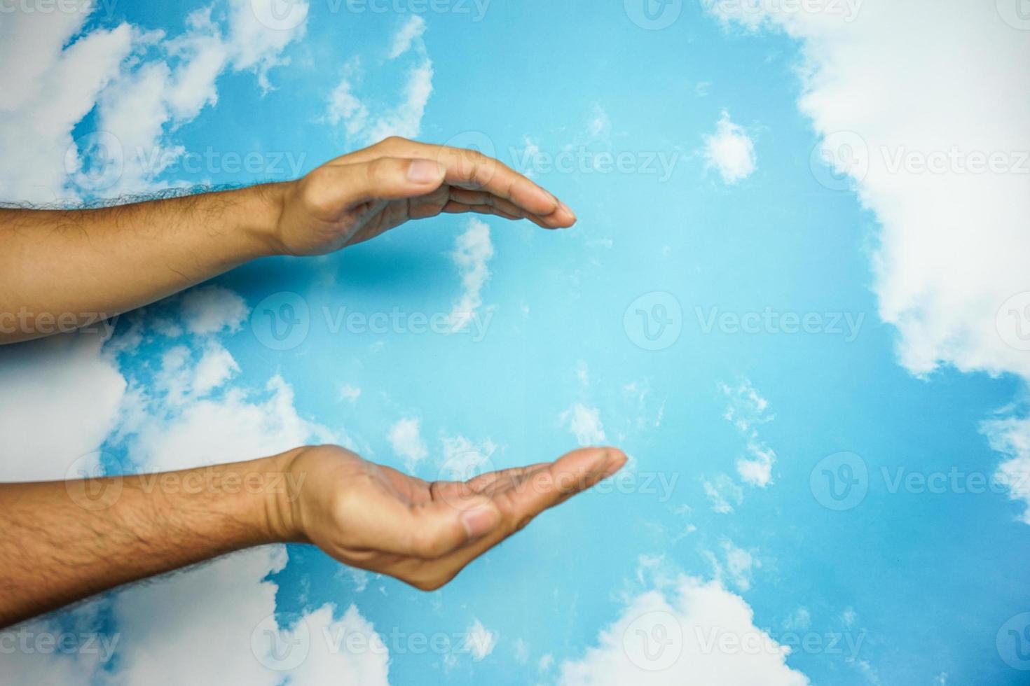 hand symbol isolated from sky background. concept of sign language photo