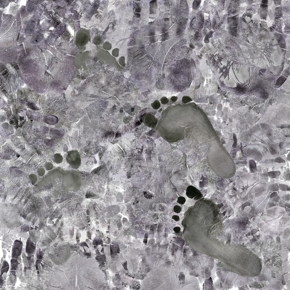 Foot prints on fingerprints. photo