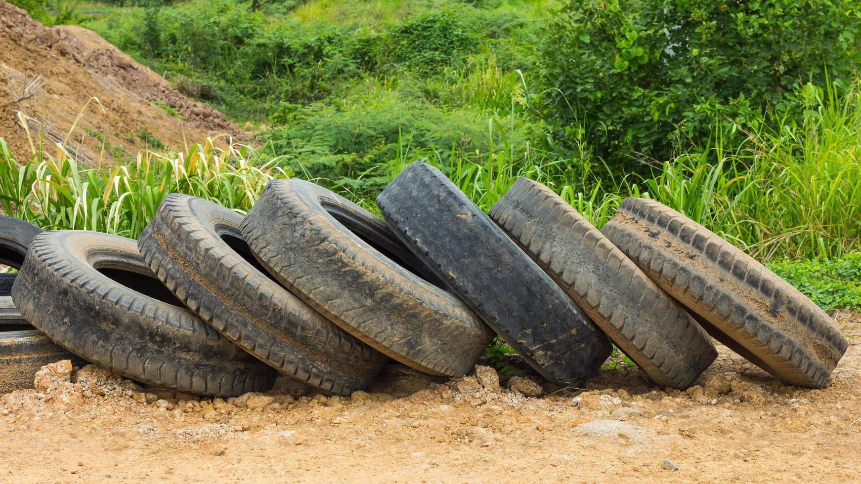 Old tires on the ground photo