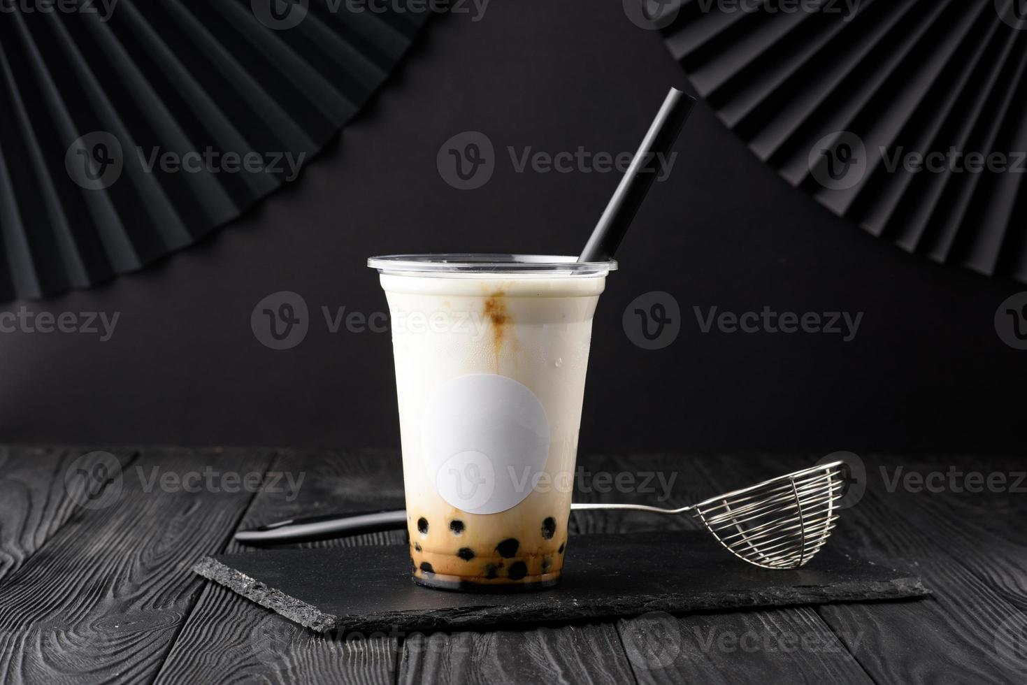 Taiwan milk tea with bubble on wood background photo