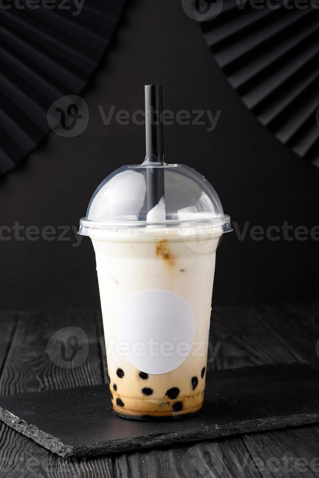 Taiwan milk tea with bubble on wood background photo