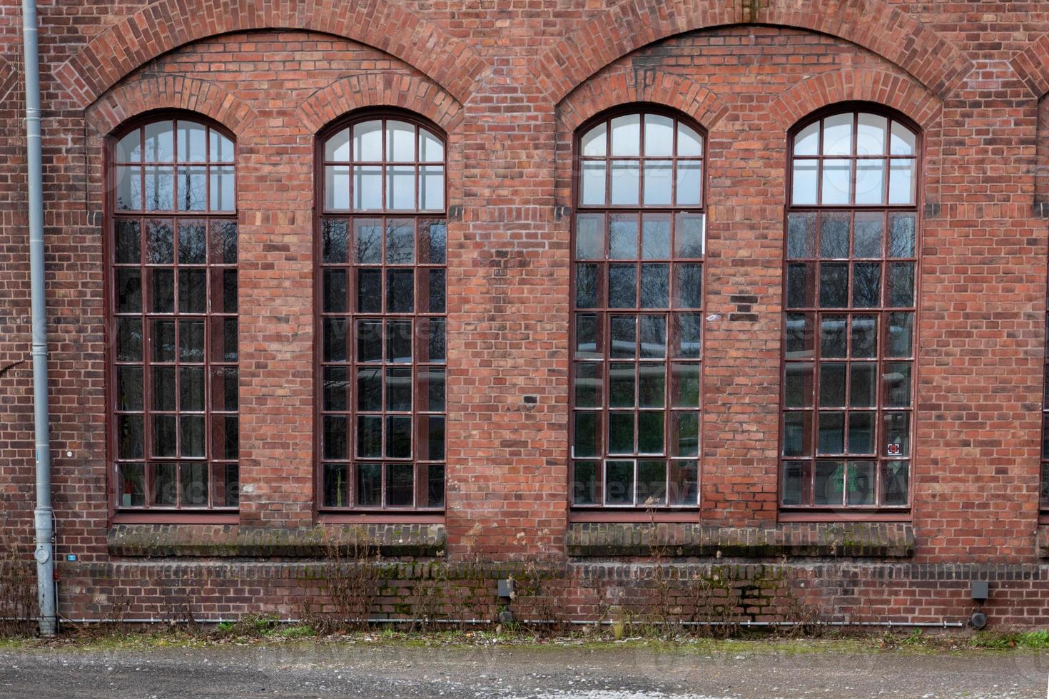 Part of an old industrial building, windows photo