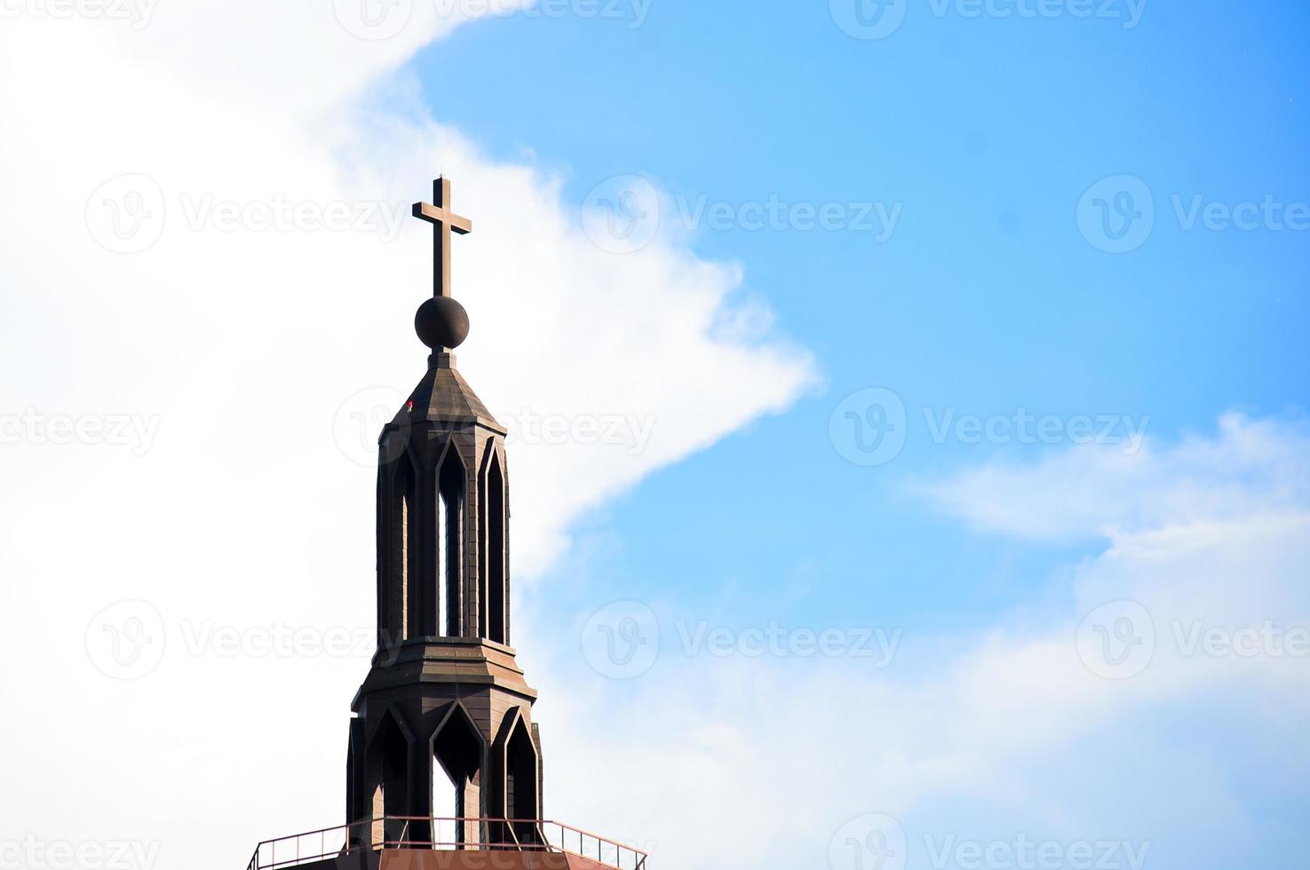 A large cross on a beautiful building photo