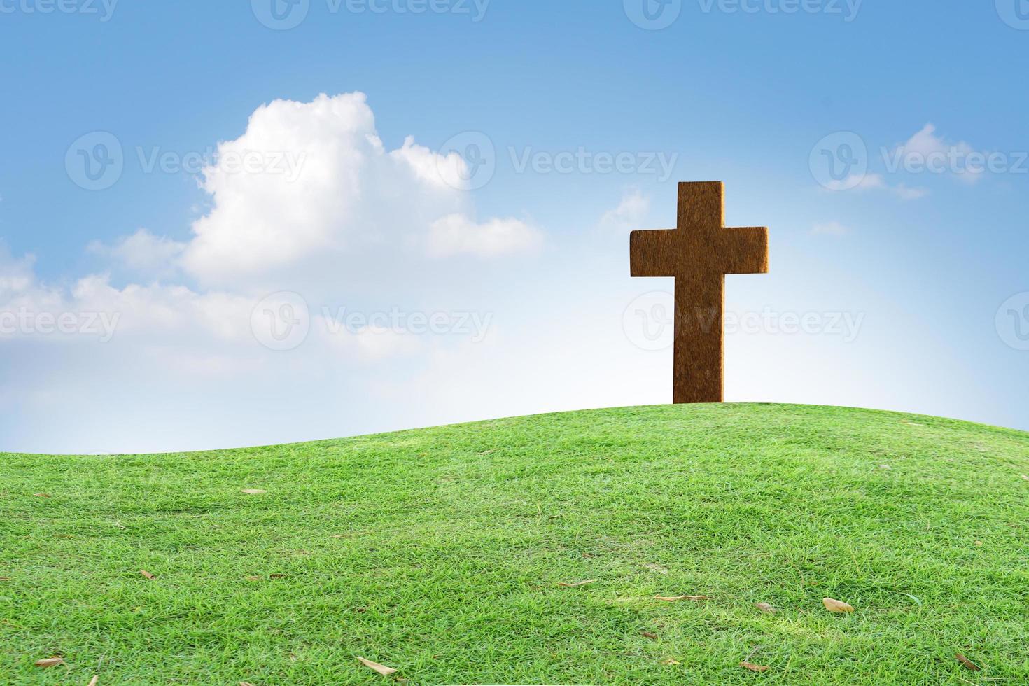 cross represents Jesus. nature blur background photo