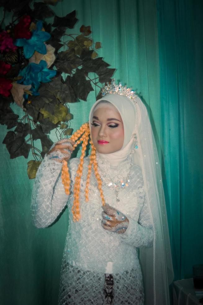 Beautiful Indonesian Muslim bride. photo