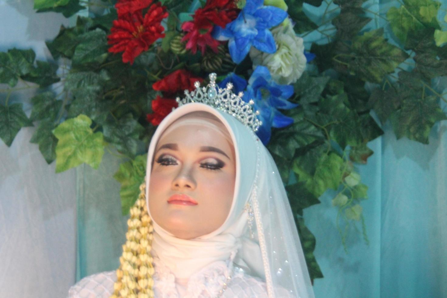 Beautiful Indonesian Muslim bride. photo