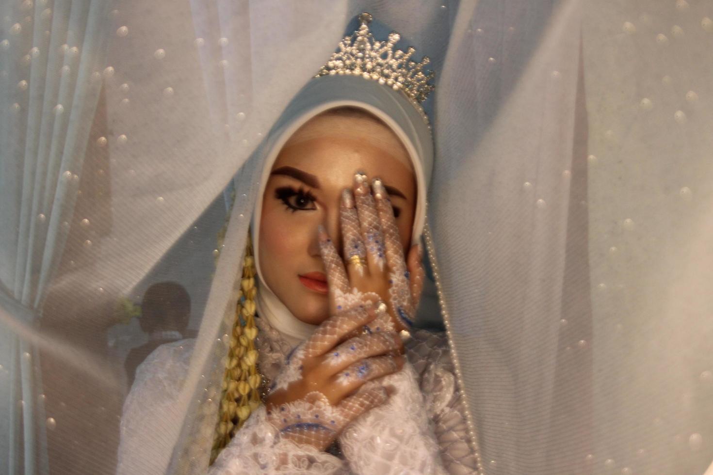 Beautiful Indonesian Muslim bride. photo