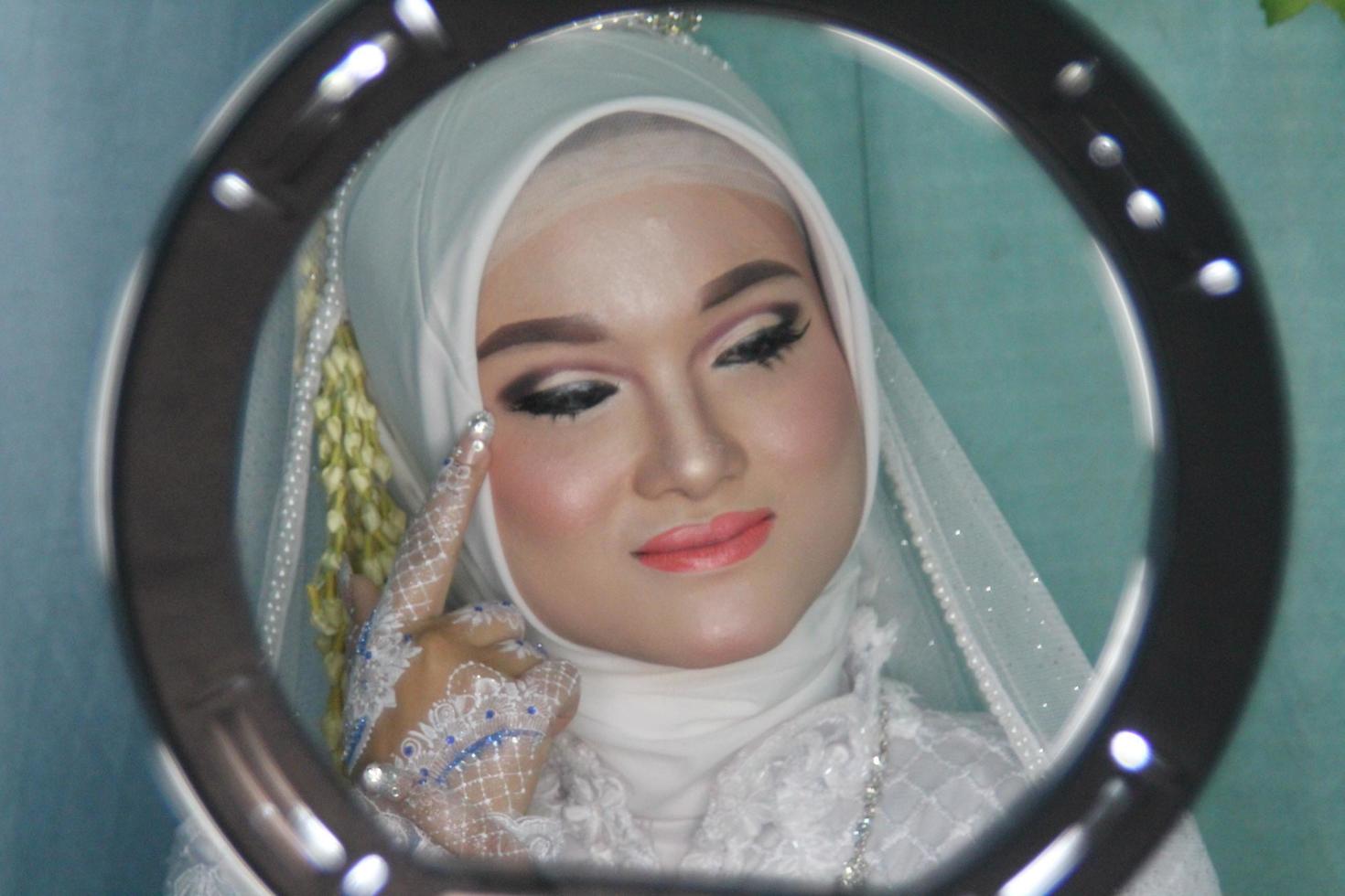 Beautiful Indonesian Muslim bride. photo